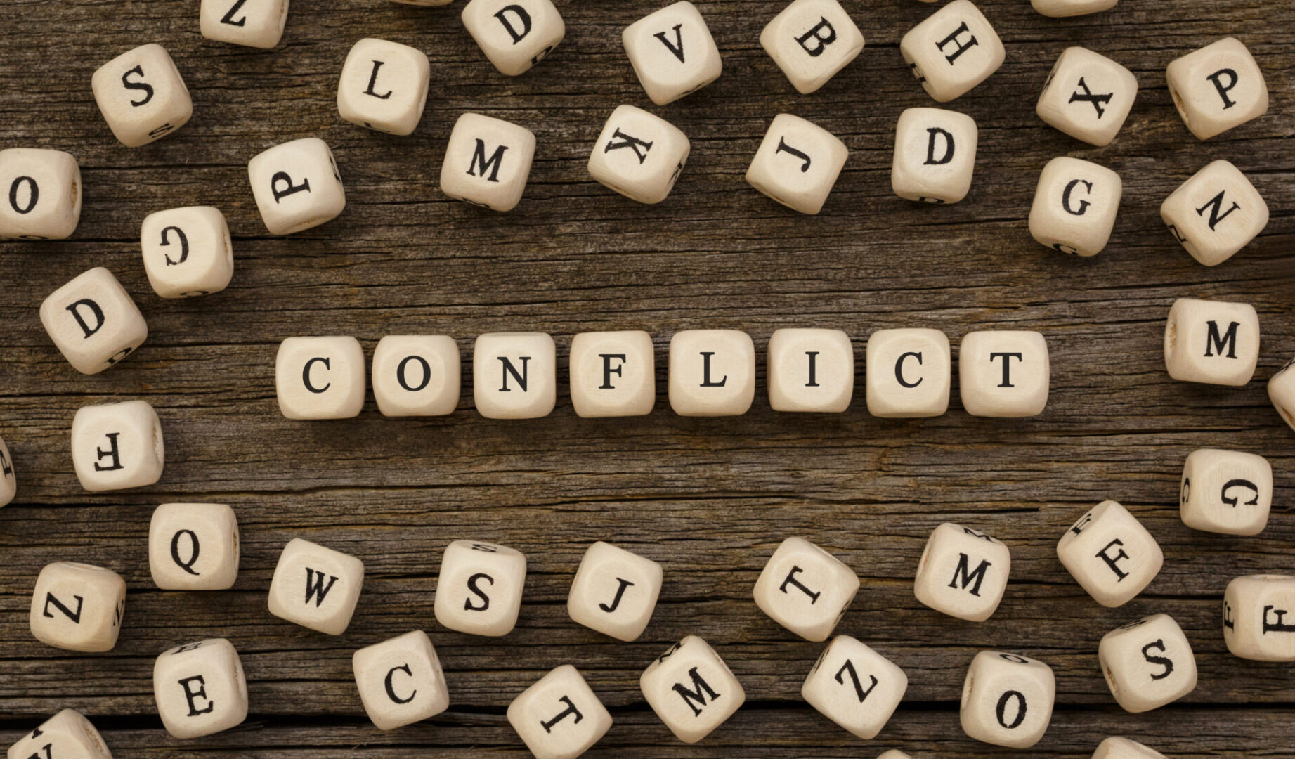 Word CONFLICT written on wood block,stock image